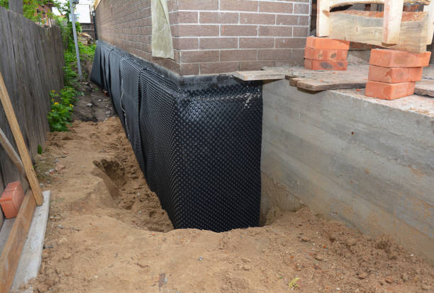 SJ Waterproofing Pros technician performing targeted Emergency Waterproofing assessment in Dahlgren, VA